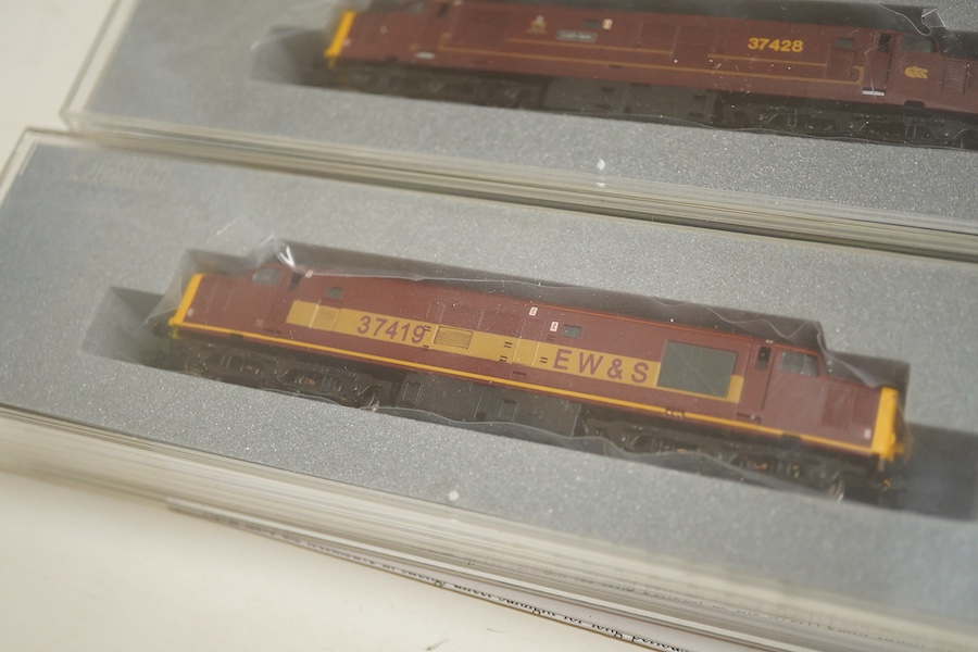 Three boxed Graham Farish N gauge railway Class 37/4 Co-Co diesel-electric locomotives; a Scottish EWS, Loch Awe (371151), a Regional Railways, Eisteddfod Genedlaethol 37429 (371154), and an EWS, 37419 (371153).